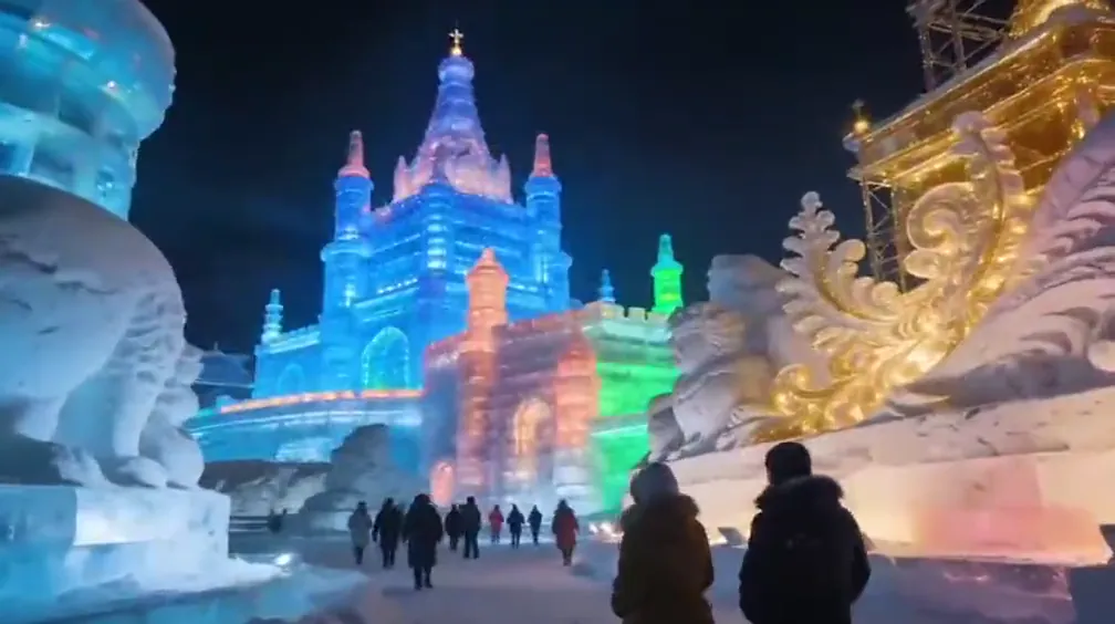 Colorful ice architecture illuminated at Harbin Ice and Snow World